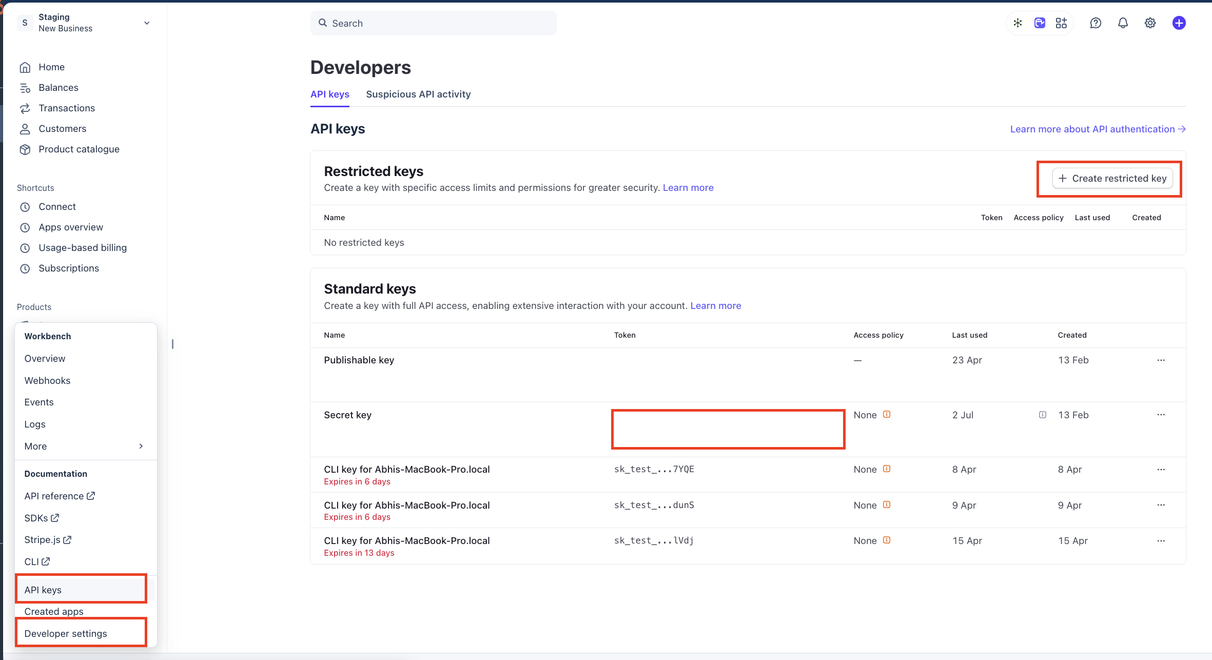 Stripe dashboard Developers API keys page with Developer settings, API keys, and Create restricted key highlighted